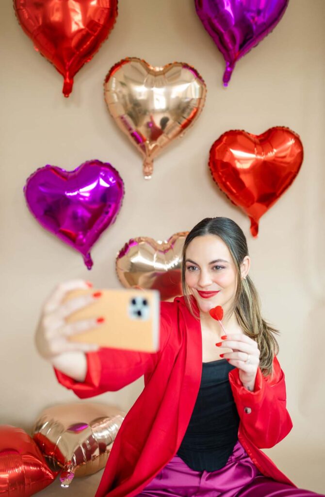 An Austin wedding photographer taking Valentine's-themed self portraits 