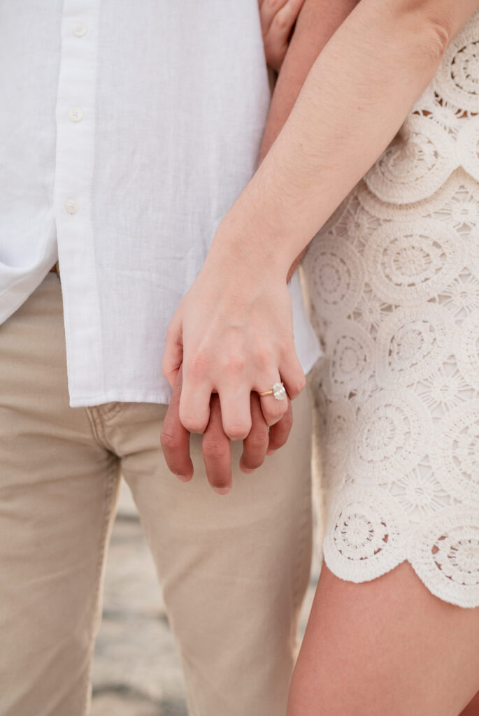 An engaged couple taking their engagement photos at Mckinney Falls State Park in Austin Texas